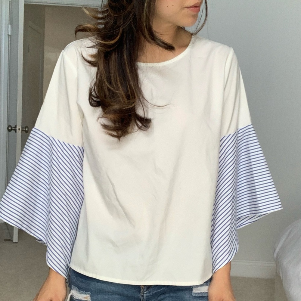 White shirt with flowy stripe sleeves